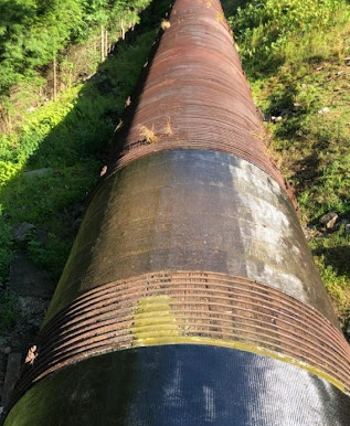 Wood stave penstock wrapped in CFRP