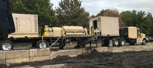 Decanting Centrifuge Dewatering Clarifier Underflow to Stackable Product for Off-site Transportation & Disposal.
